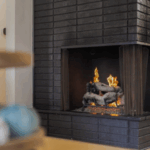 Cozy fireplace inside a West Michigan Lakeshore home in winter