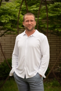 West Michigan realtor Josh Stehouwer standing outdoors