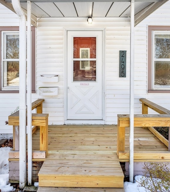 Front porch entry of a West Michigan Lakeshore home in winter