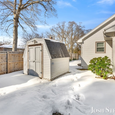 lakeshore-home-lake-view-west-michigan-snow-yard.jpg