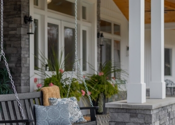 porch-swing-holland-lake-home-exterior.jpg